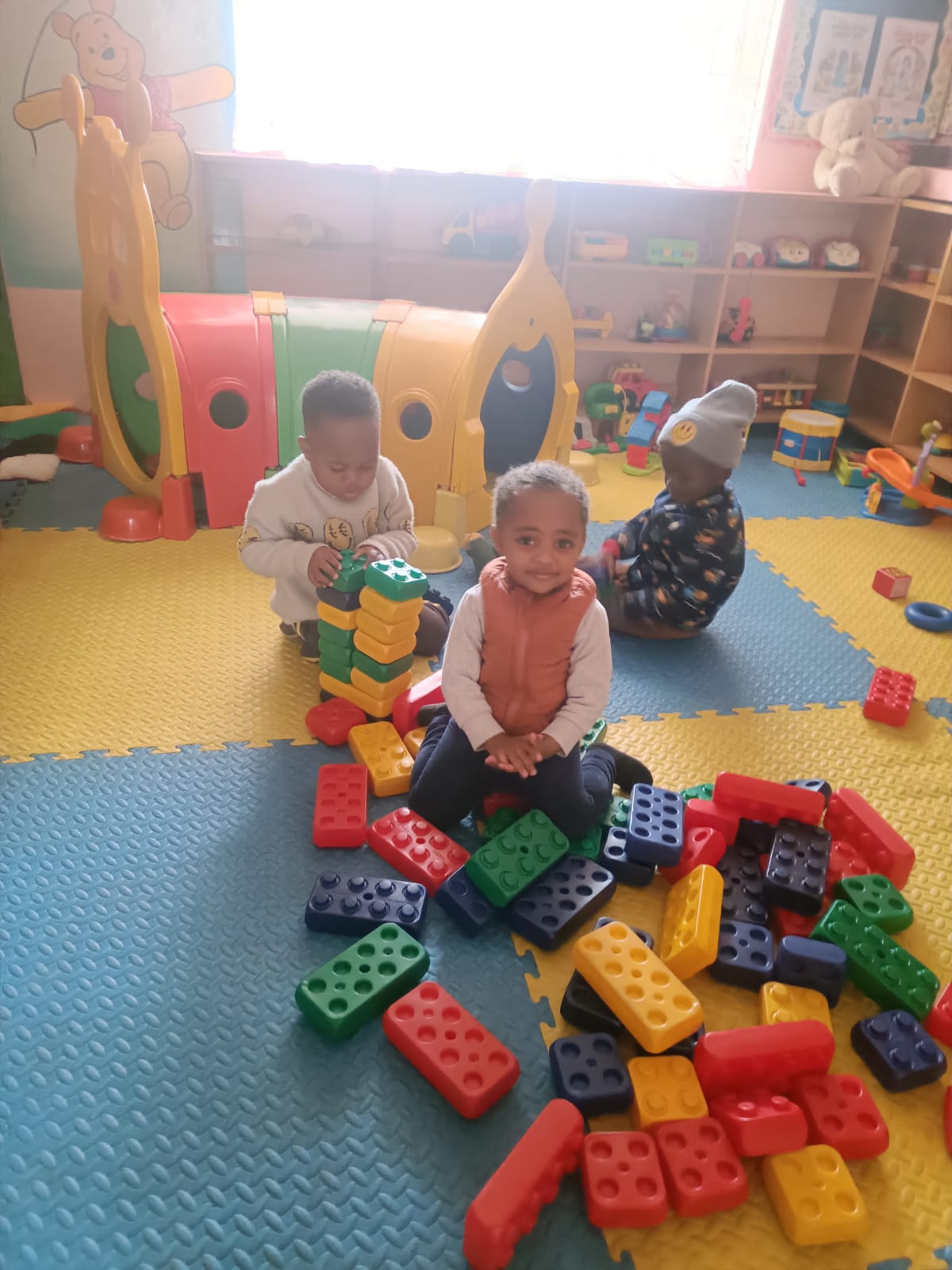 Child engaged in an early learning activity at Bloomsfield daycare